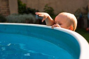 Infant near swimming pool